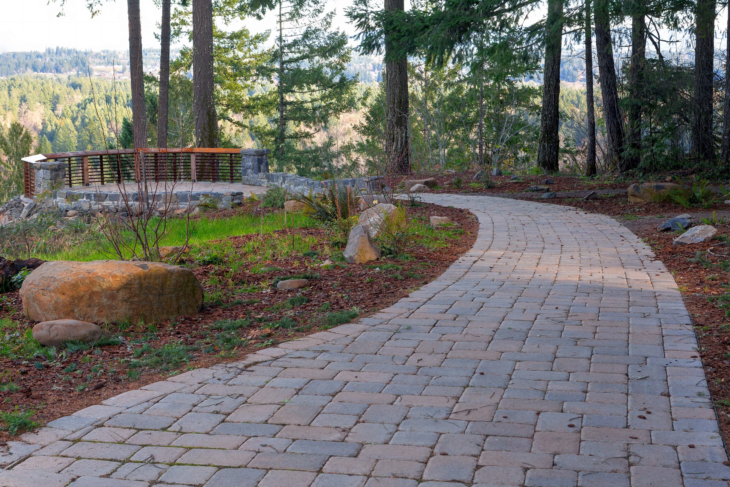 Garden Stone Brick Paver Walking Path to Backyard Deck built by a hardscaper
